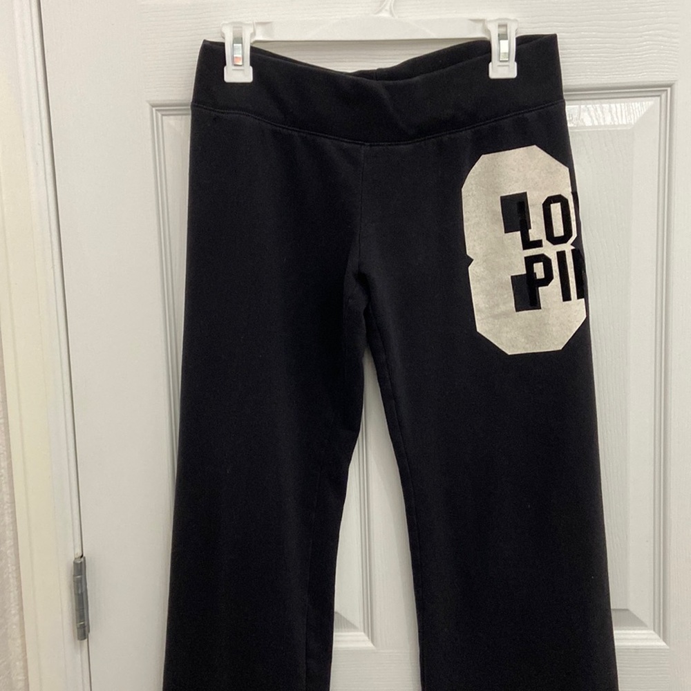 Victoria’s Secrets PINK. Black sweat pants. Size small and White T-shirt